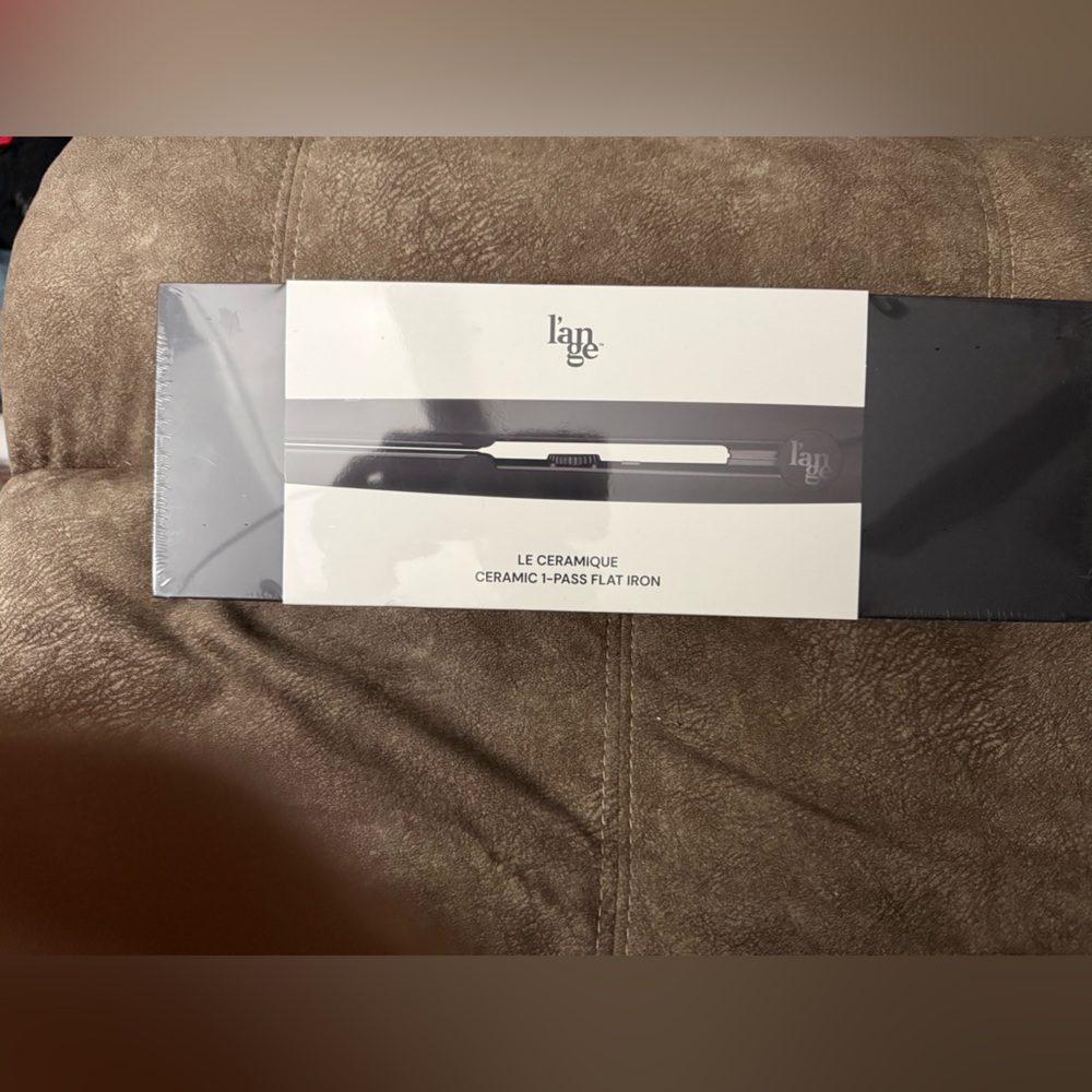 NEW and sealed 1” L’ange flat iron